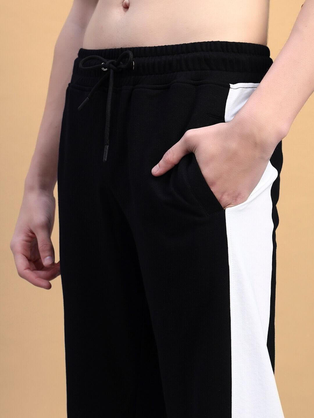Close-up of BELGIANS RELAXED-FIT JOGGERS BLACK BLUE showcasing sleek design and comfort.