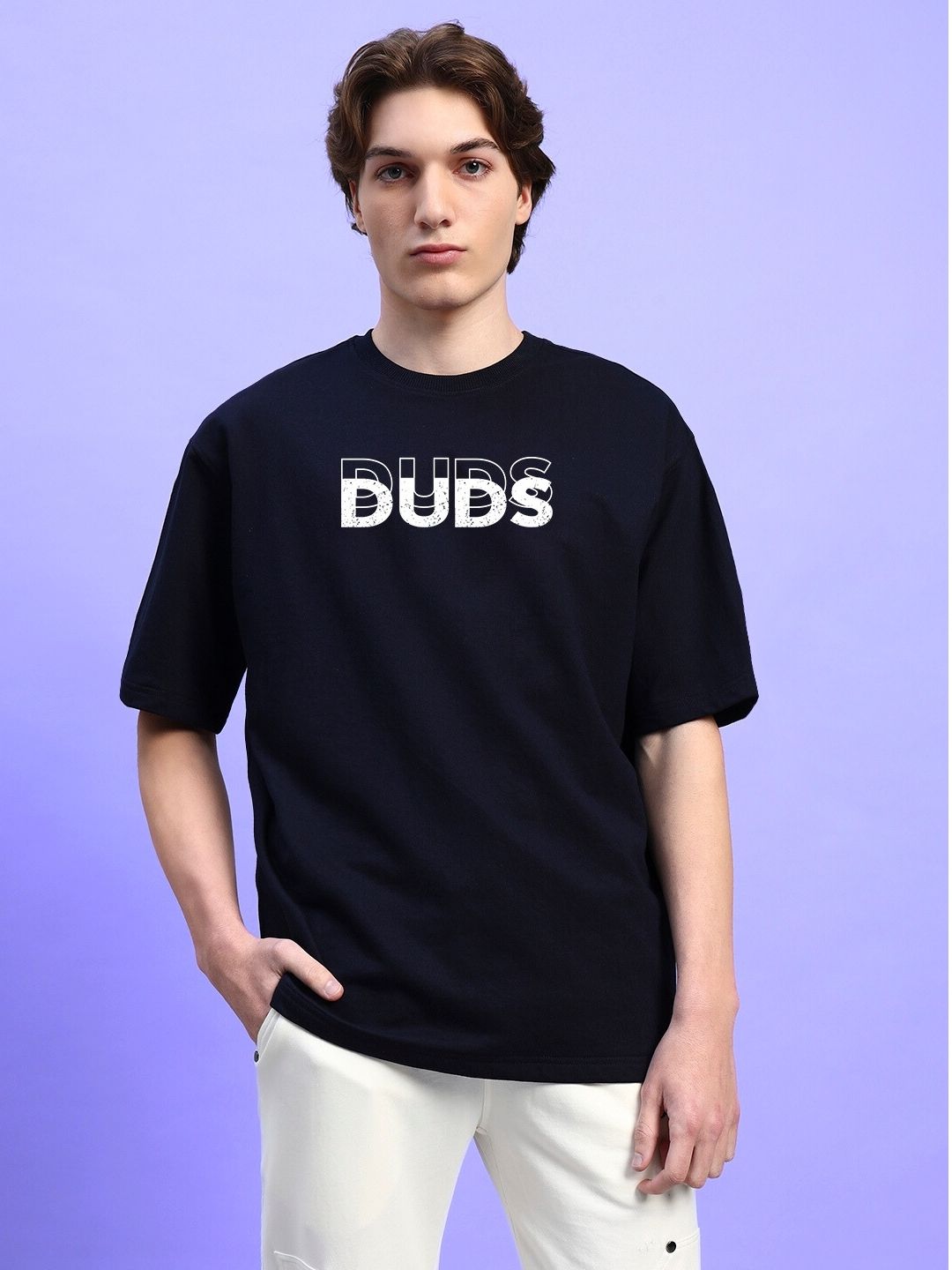 EVERYTHING IS TEMPORARY OVER-SIZED T-SHIRT BLACK worn by model against purple backdrop.