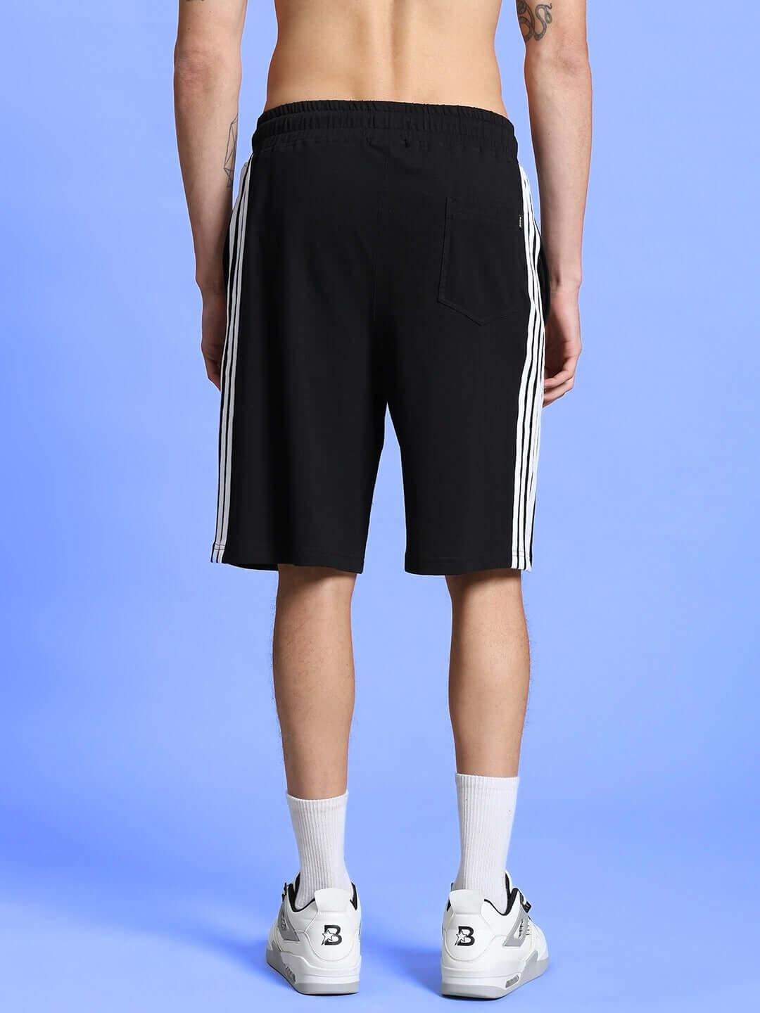 Back view of PARKA REGULAR FIT SHORTS BLACK, showing versatile black color and comfortable fit for active lifestyles.