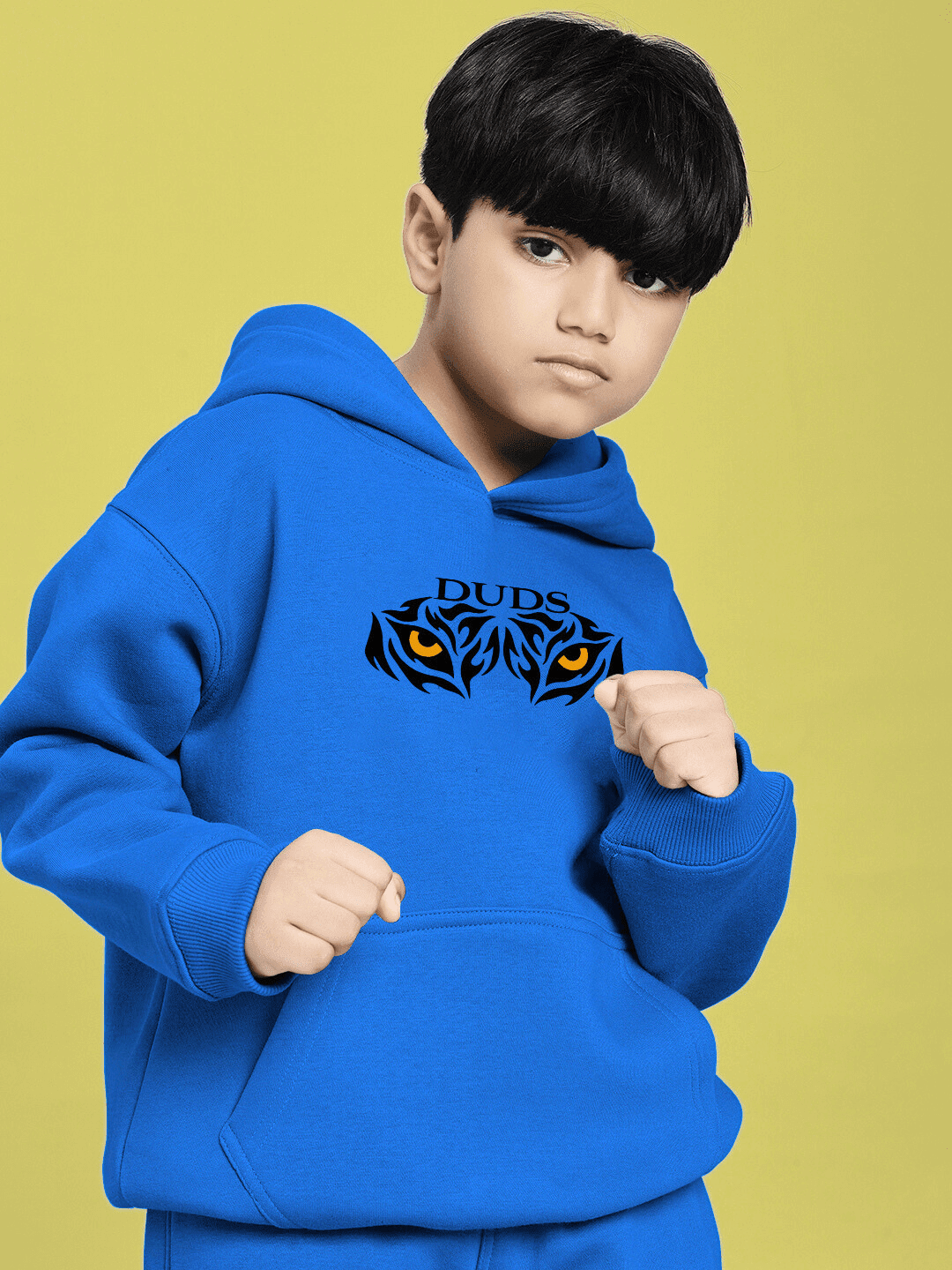 A JOURNEY WITHIN FLEECE HOODIE FOR BOYS AND GIRLS BLUE, showcasing a young boy wearing a cozy and stylish blue hoodie with tiger graphic.