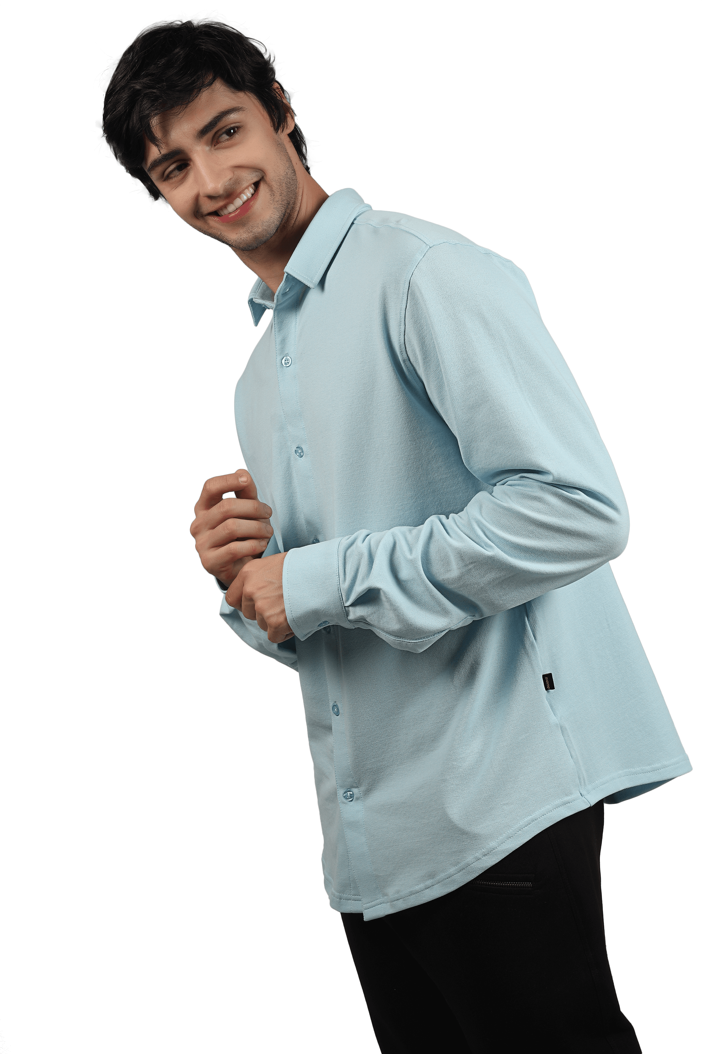 Model wearing a powder blue sporty pique shirt with full sleeves and curved hem, showcasing a slim fit and comfort features.