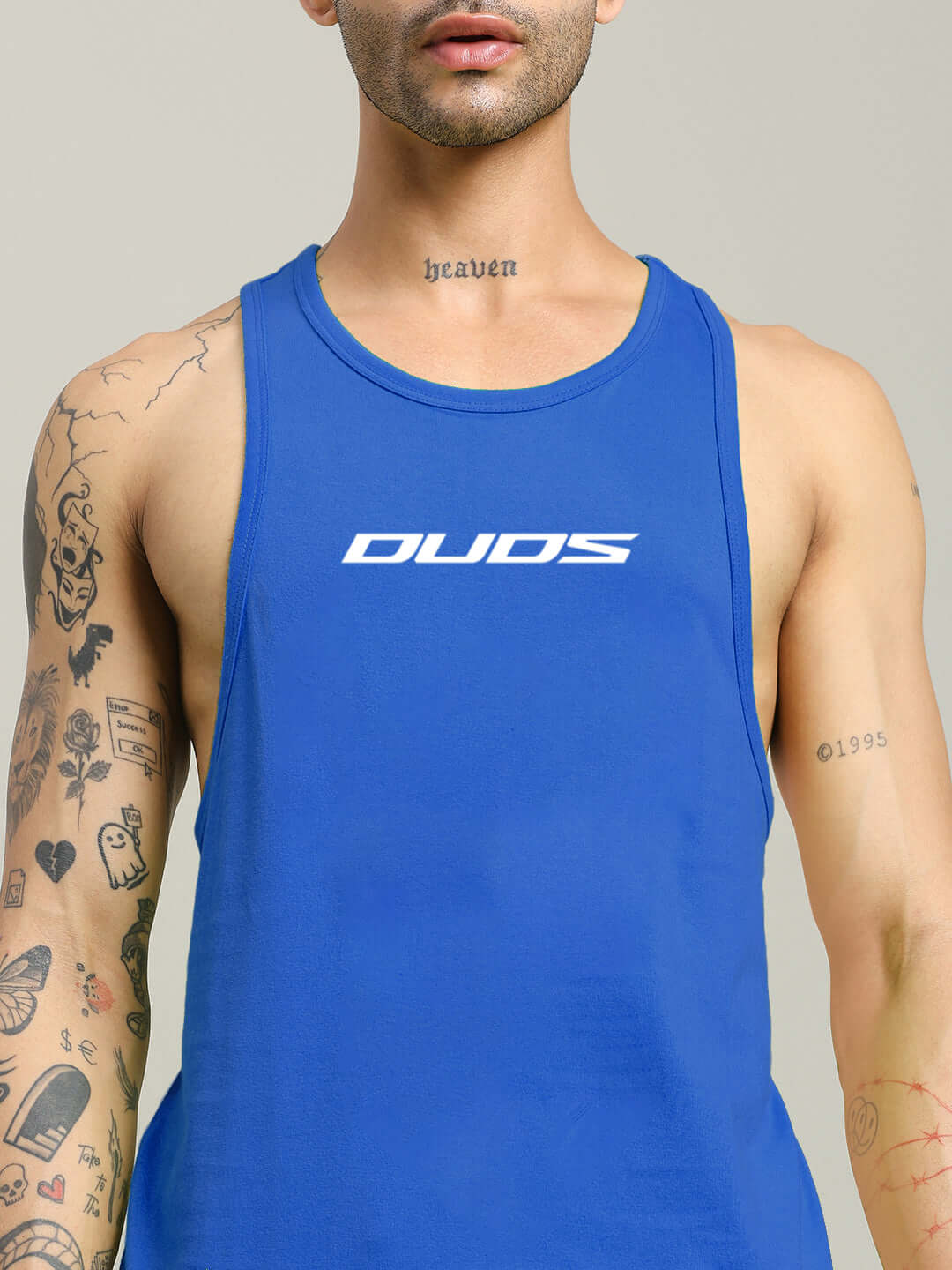 Person wearing RUN FOR LIFE SLEEVELESS GYM T-SHIRT BLUE for athletic performance and style.