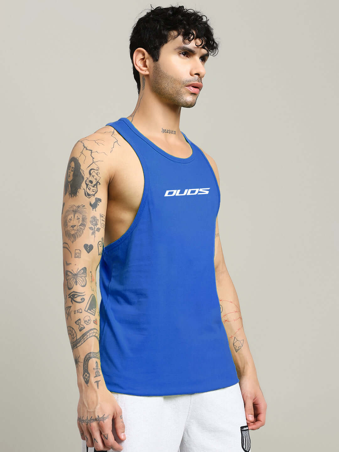Athlete wearing RUN FOR LIFE SLEEVELESS GYM T-SHIRT BLUE, showcasing athletic style and comfort with quick-dry fabric in energizing blue.