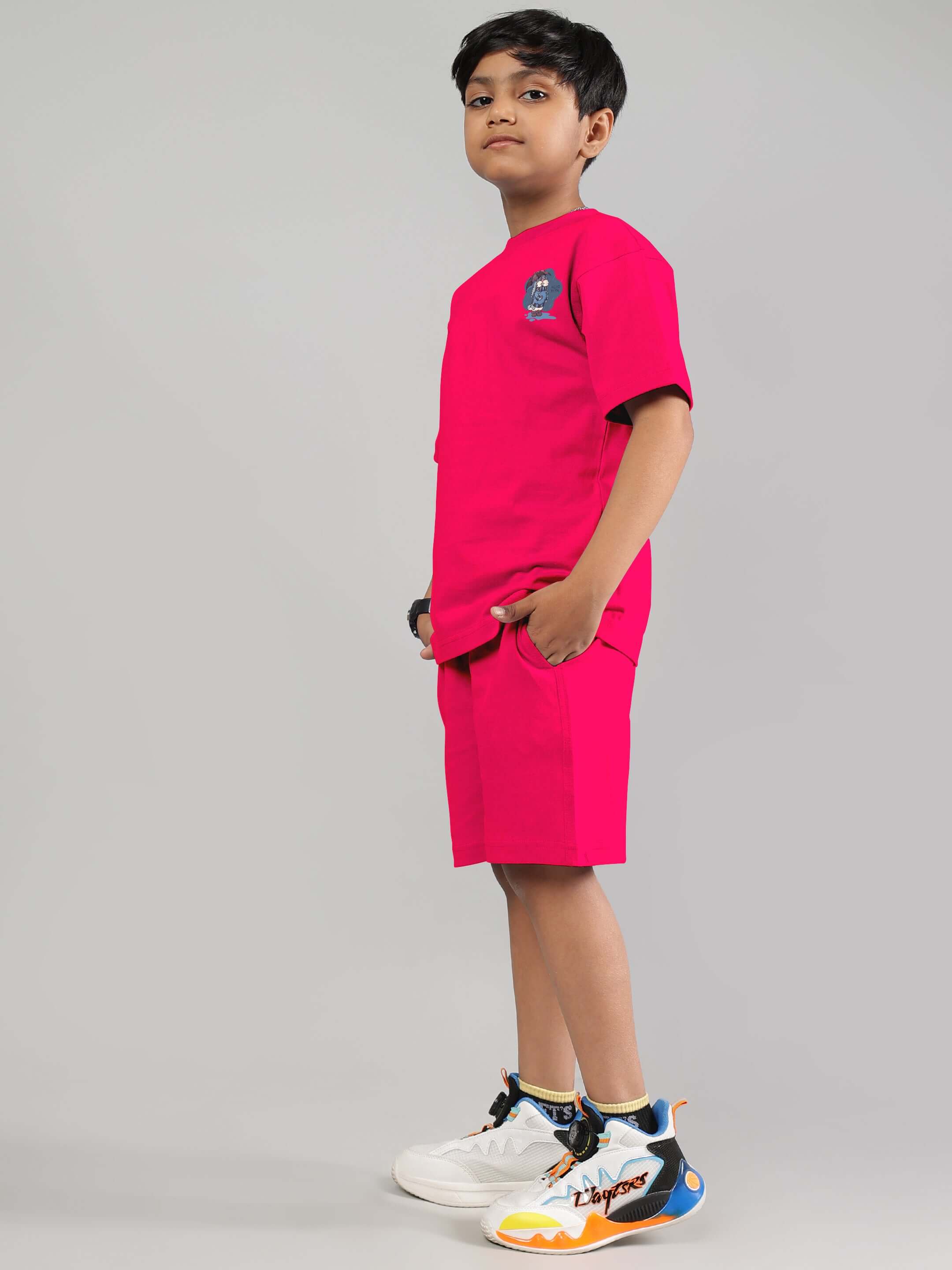 Child wearing Blue Lapin Co-Ord for Boys Girls Pink, unisex summer outfit made from 100% cotton, featuring cute graphic design.