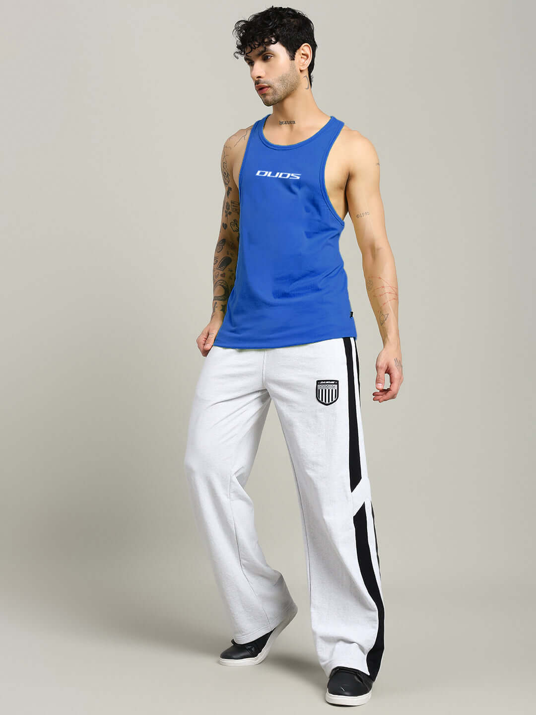 Man wearing RUN FOR LIFE SLEEVELESS GYM T-SHIRT BLUE, perfect for workouts and fitness, showcasing style and comfort.