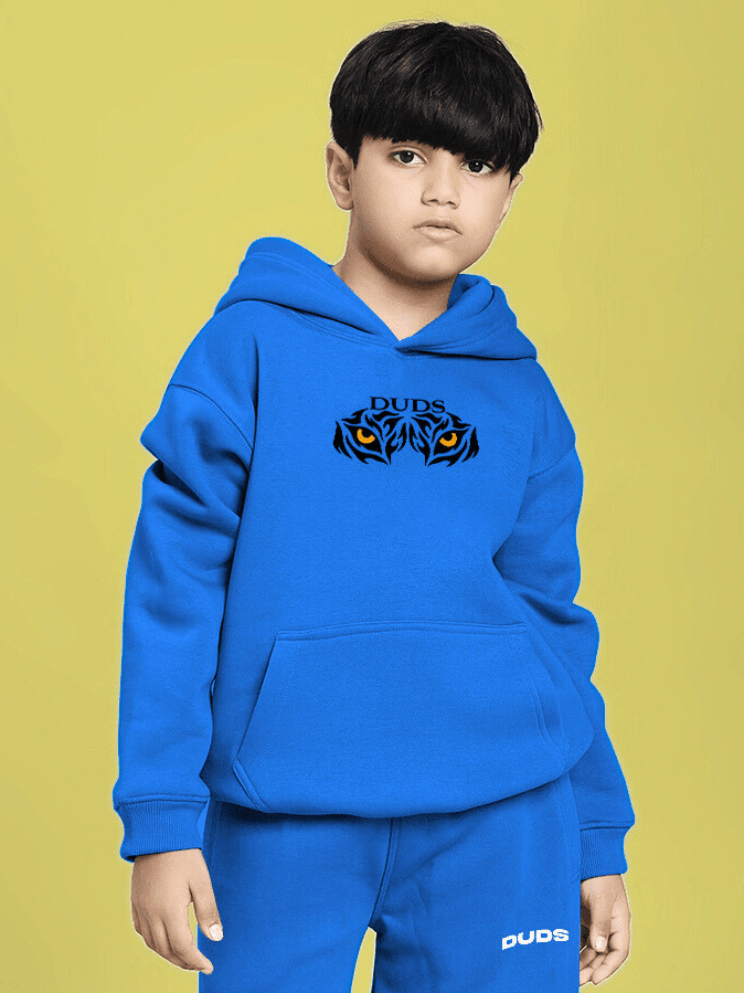 Child wearing A JOURNEY WITHIN FLEECE HOODIE FOR BOYS AND GIRLS BLUE, showcasing cozy blue hoodie with inspiring graphic design.