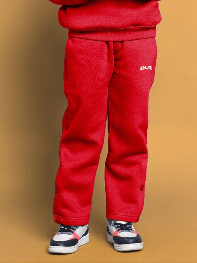 Red joggers for boys and girls, featuring a comfortable fit and stylish design for active kids.