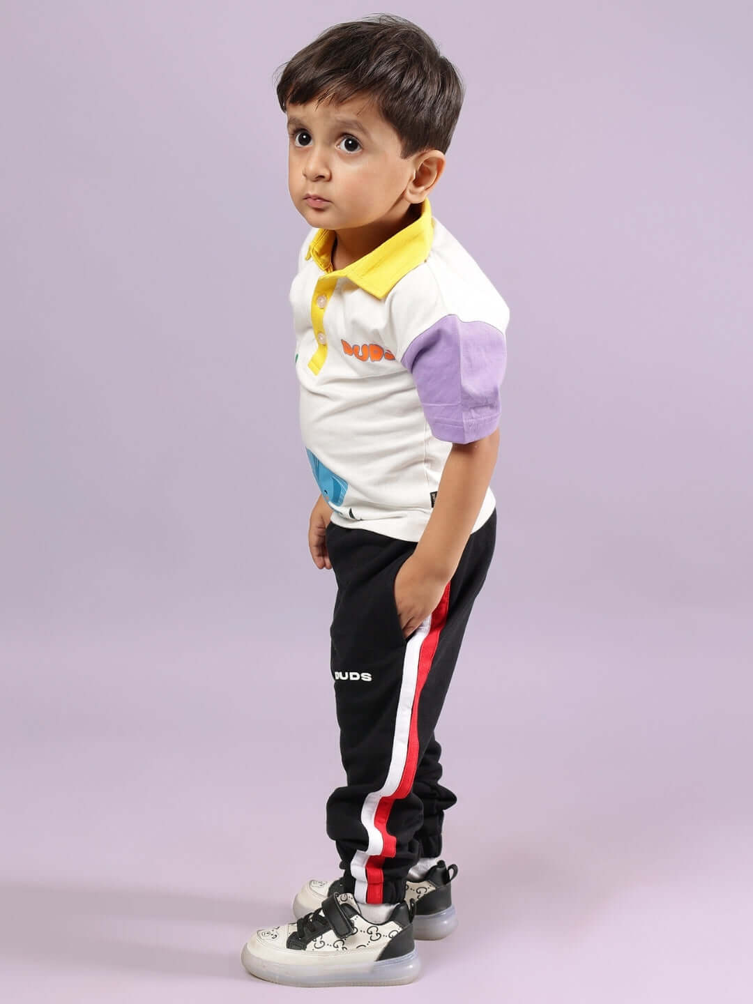 Child wearing BORNEO CO-ORD FOR BOYS & GIRLS OFF WHITE-BLACK outfit from DUDS