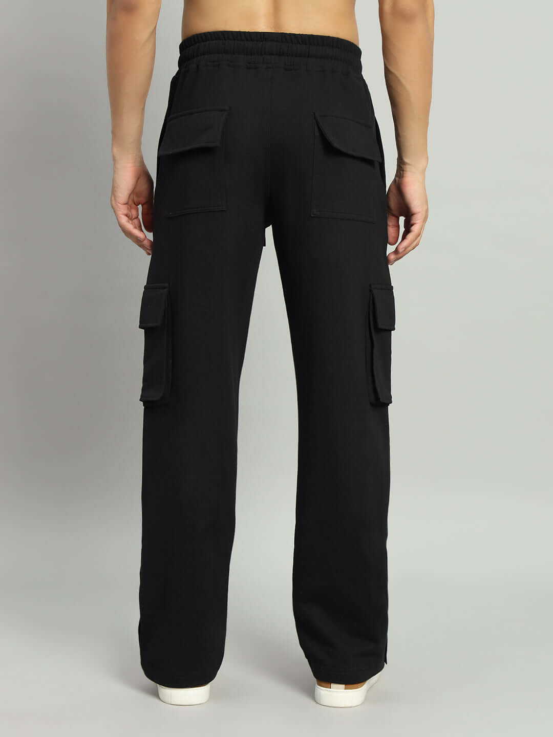 Back view of black BRACE 8 Pocket Cargo Pants showcasing pockets and wide leg, suitable for custom fit. DUDS craftsmanship.