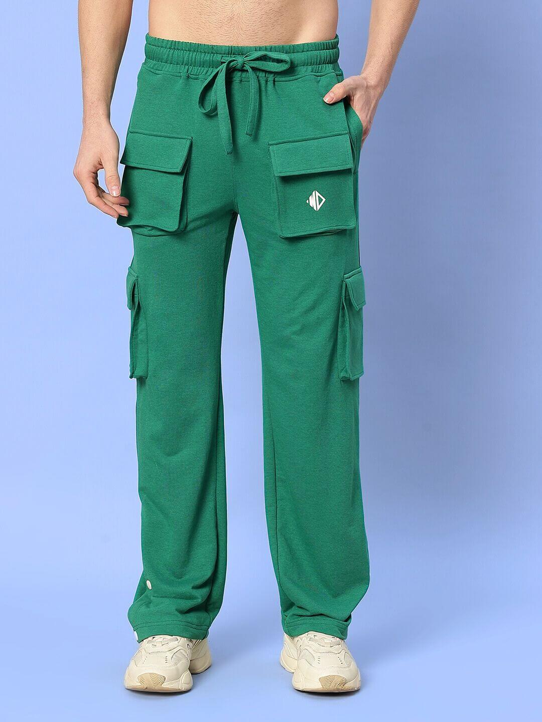 Teal green 8 pocket cargo pants by DUDS, featuring adjustable waistband and durable fabric, tailored for comfort and style.