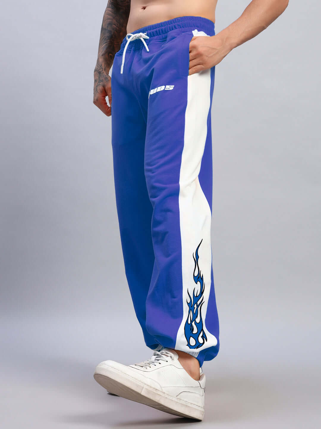 Blue-white relaxed fit joggers with flame detail, made to order by DUDS with custom fit options.