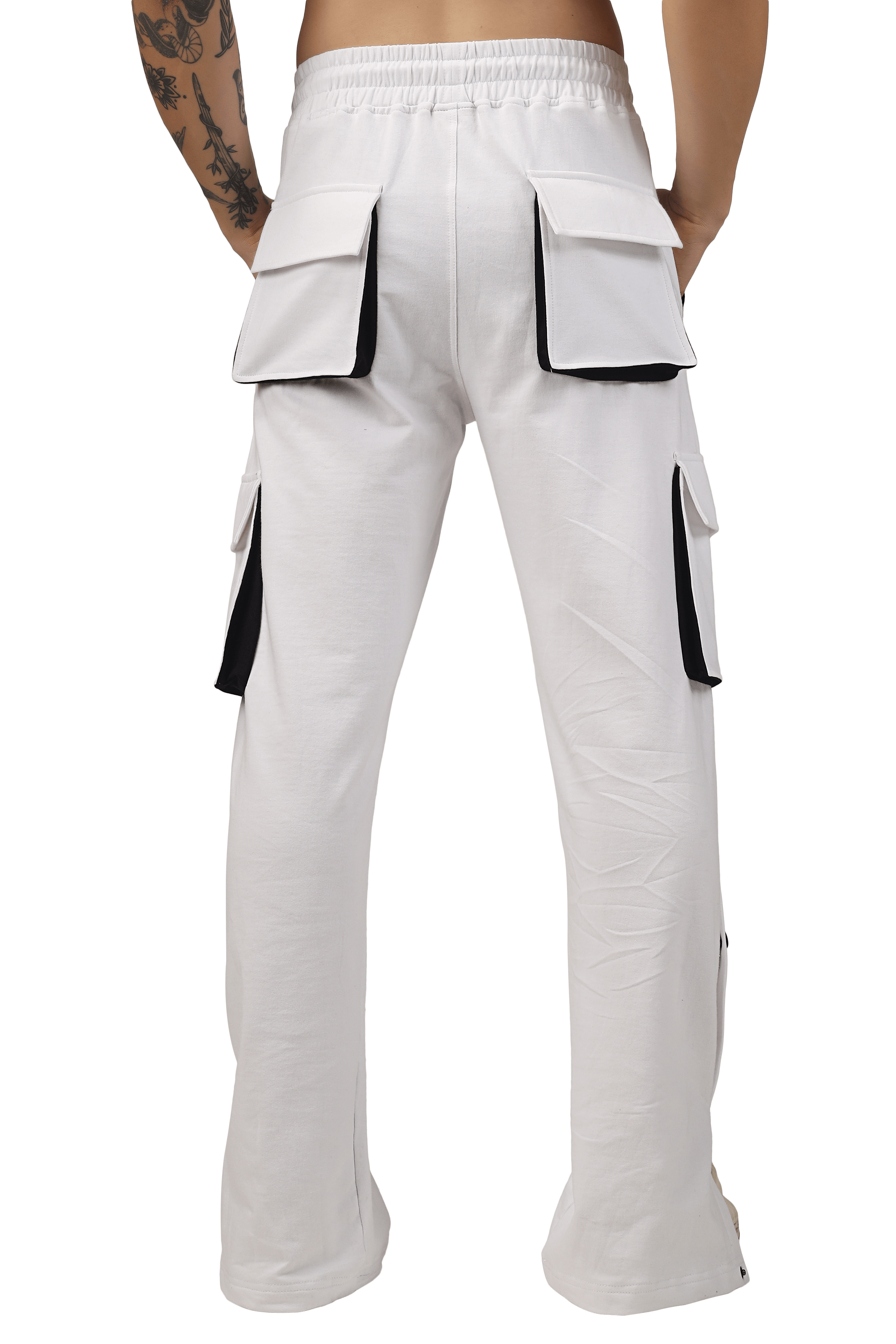 Back view of white cargo pants with black highlights and multiple pockets by DUDS.