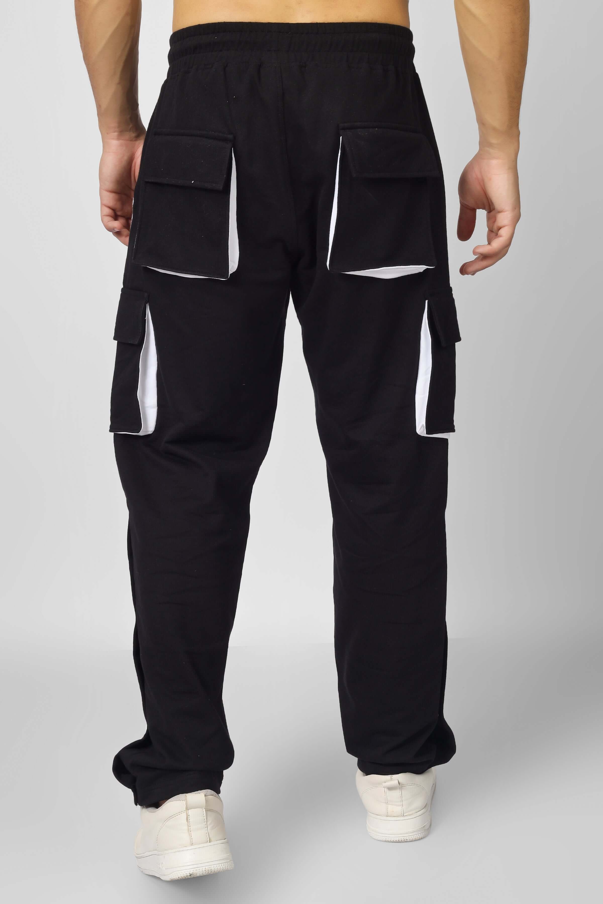 Back view of black and white Bracket Cargo Pant with highlighting pockets, designed by DUDS.