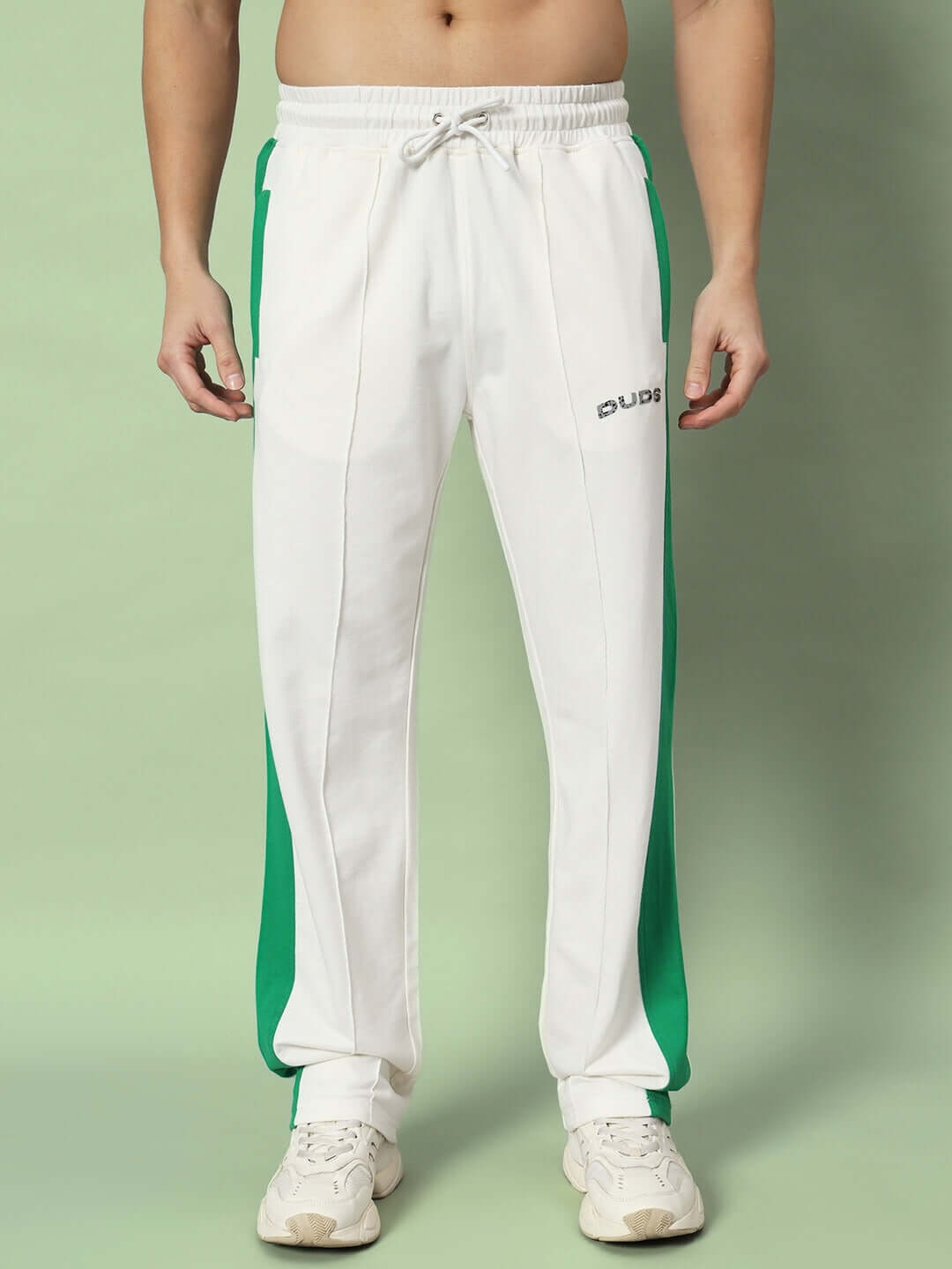 Off-white green joggers with side contrast for men by DUDS, made-to-order with custom fit options, front view.