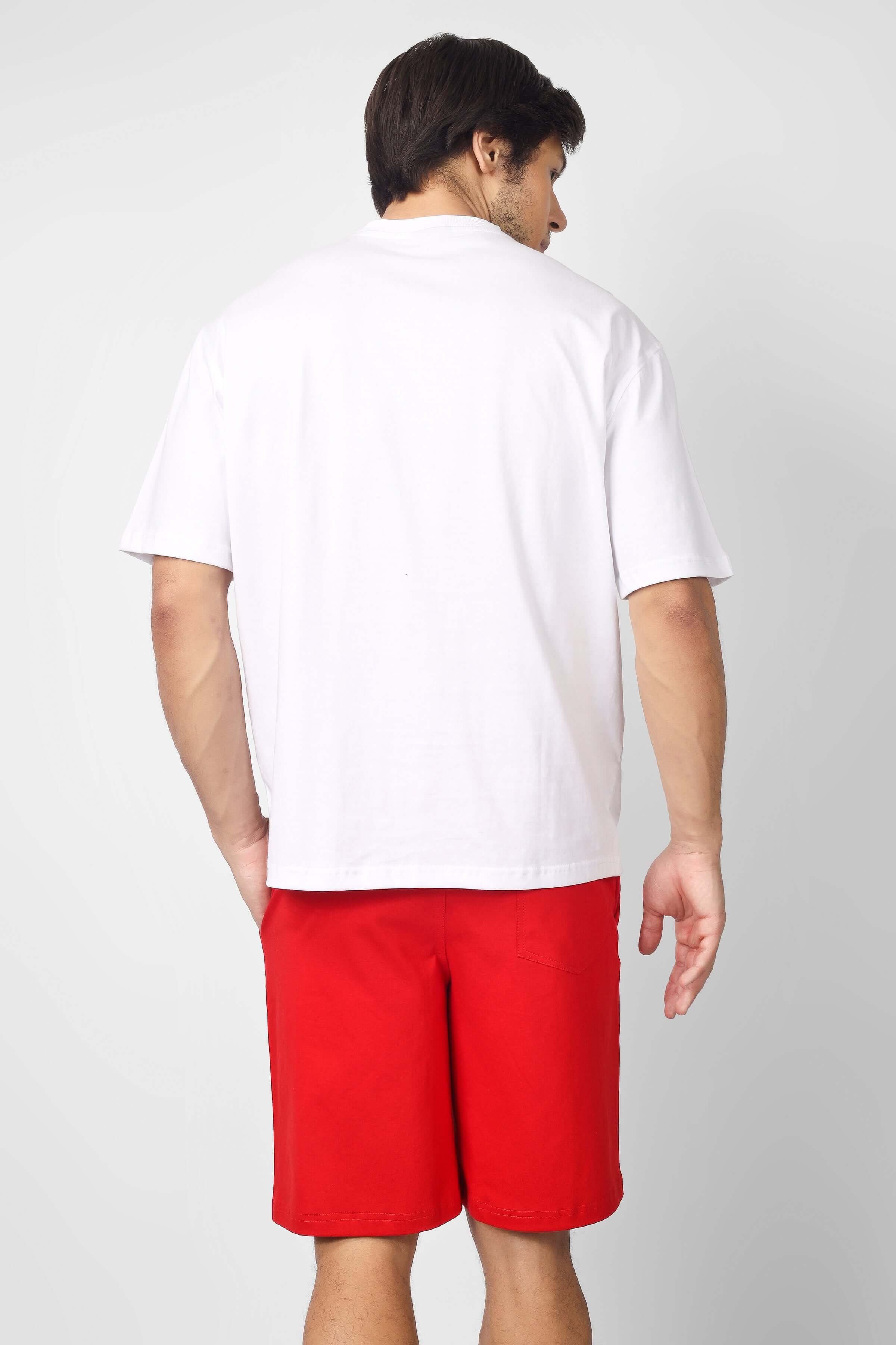 Back view of a person wearing the BROOKLYN CO-ORD SET in white and red, featuring a white t-shirt and red shorts.