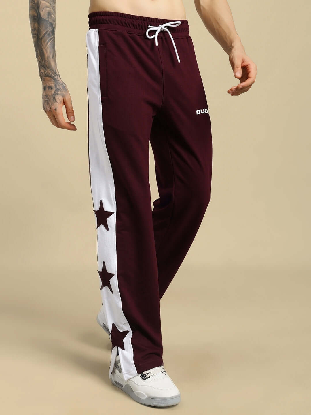 BROX STAR Relaxed Fit Joggers in Maroon-White with star detailing, customizable fit available, crafted by DUDS Tailors. Shipping in 7-10 days.