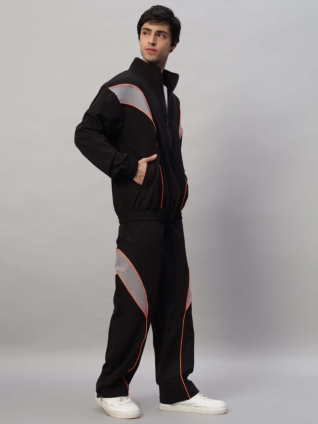 Model wearing BULLET OVERSIZED CO-ORD SET BLACK for streetwear fashion, front view with modern design details.