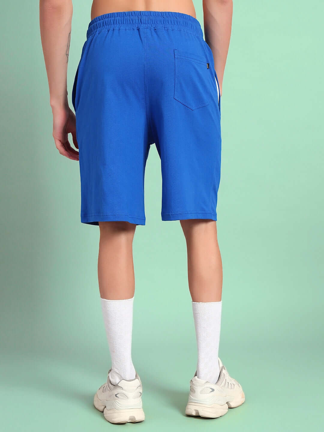 Back view of Bunny Bugs Summer Shorts in blue, featuring elastic waistband and pocket, customizable fit available for tailored comfort.