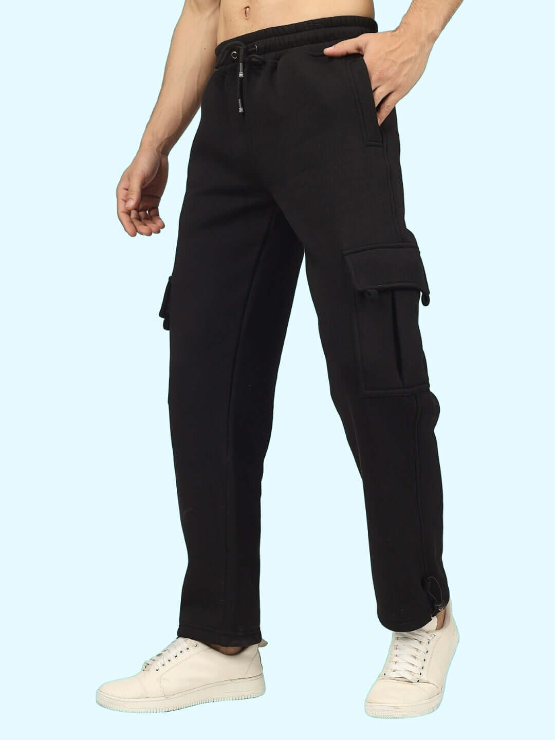 Model wearing black cargo pants from the Burly Black Overshirt-Cargo Pant Co-Ord Set, featuring side pockets and drawstring waist.