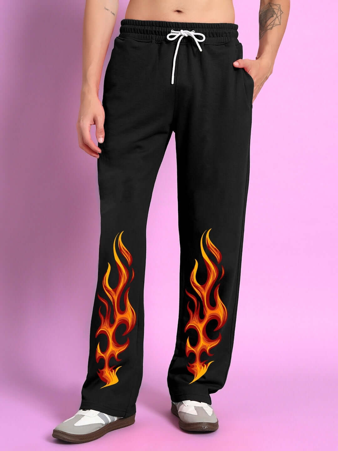 Black jogger pants with flame design, customizable size, handmade by experienced tailors at DUDS, shipping in 7-10 days.