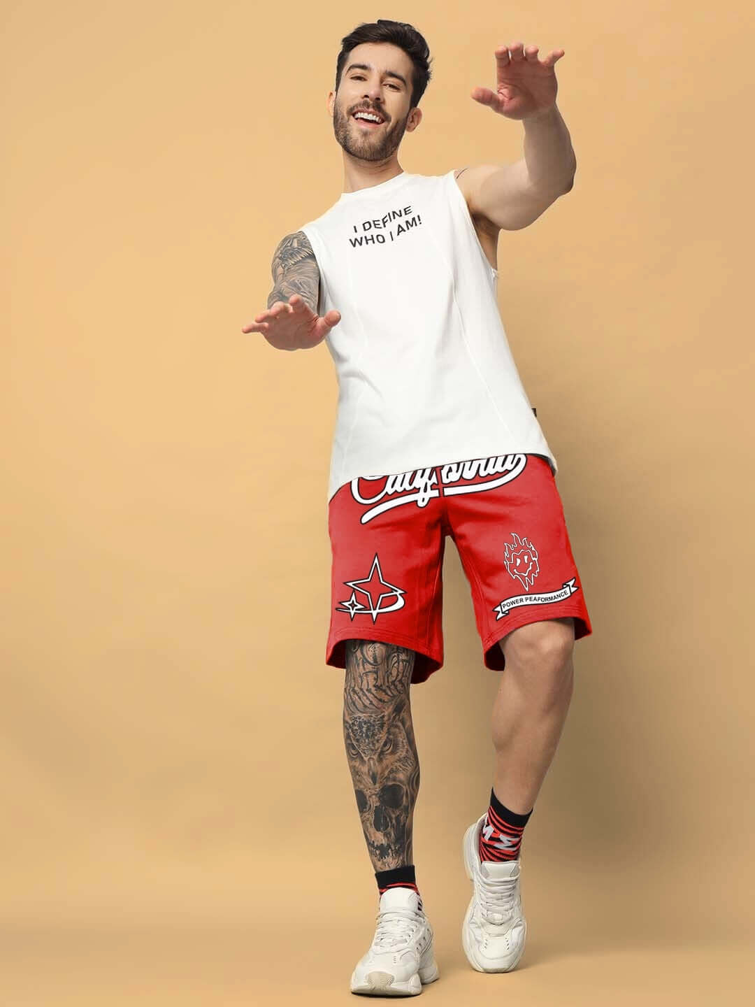 California Regular Fit Red Shorts with graphic print, customizable sizing available, worn by a man standing casually against a neutral backdrop.