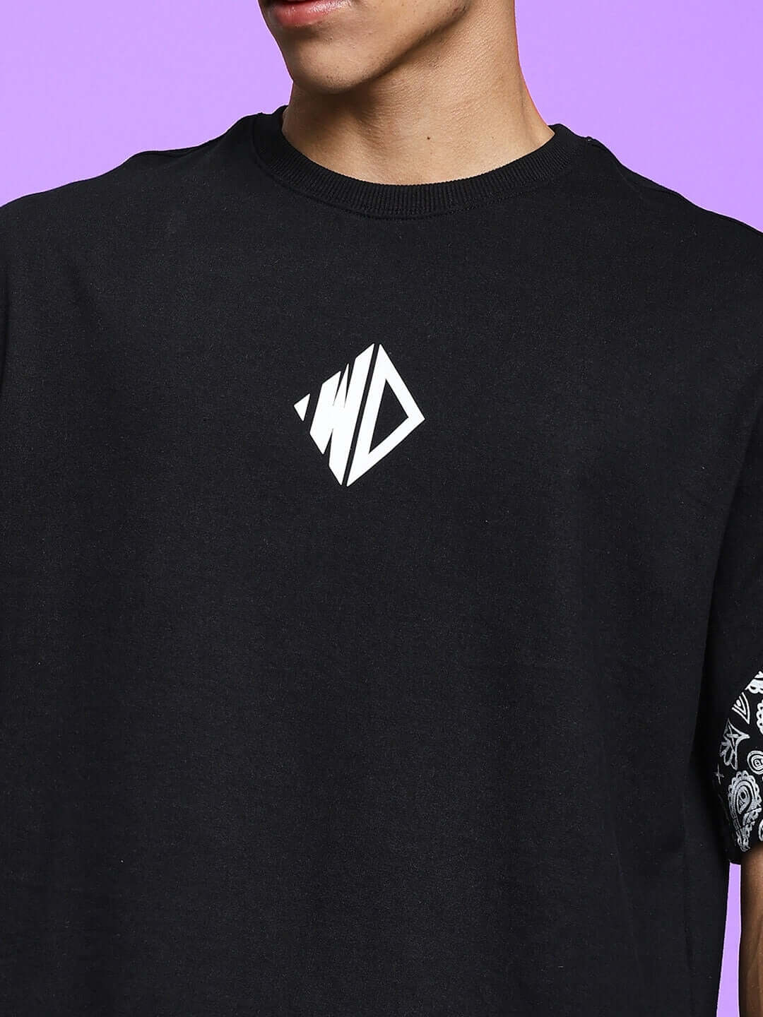 Black Calvin Co-Ord Set in premium cotton with geometric logo, 97% cotton and 3% elastane blend, perfect for stylish comfort.