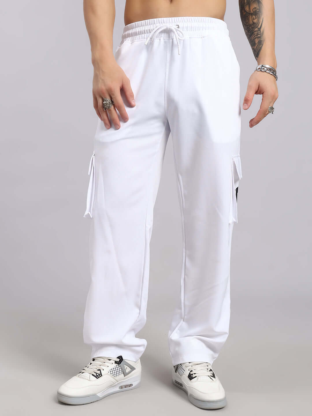Carmine relaxed fit white jogger pants, designed by DUDS. Made-to-order with customizable sizing options. Casual and stylish.