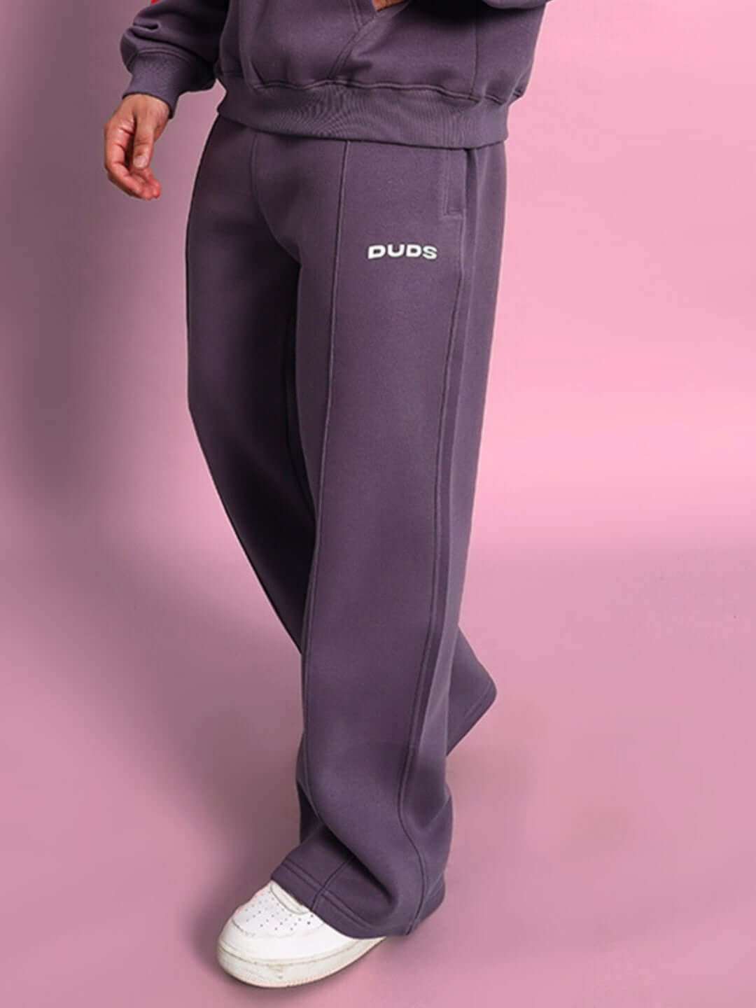 Person wearing CASPER Cotton Fleece Jogger in Violet by DUDS, featuring a relaxed fit and made-to-order quality by expert tailors.