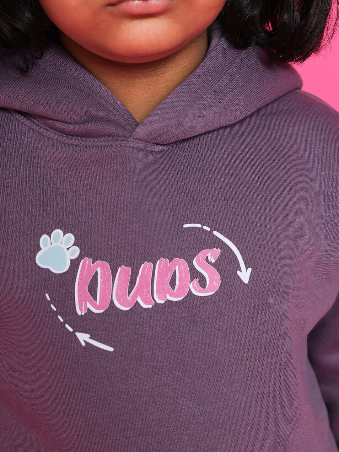 Child wearing violet Casper Co-ord hoodie with pink 'DUDS' graphic
