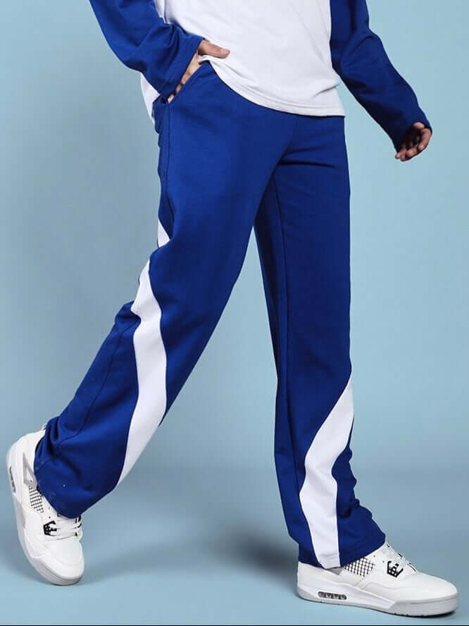 Person wearing Celestine Cool Relaxed Fit Jogger in blue-white, showcasing casual athletic style and comfort.