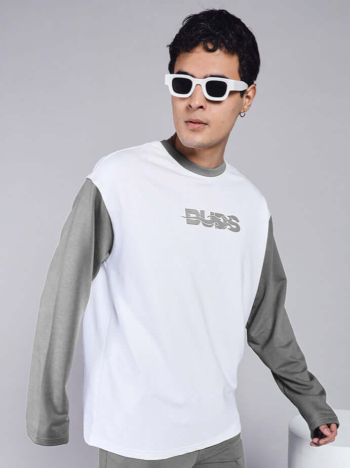 Model wearing CELESTINE COOL SWEATSHIRT in white grey, crafted from 97% premium cotton, posing with stylish sunglasses.