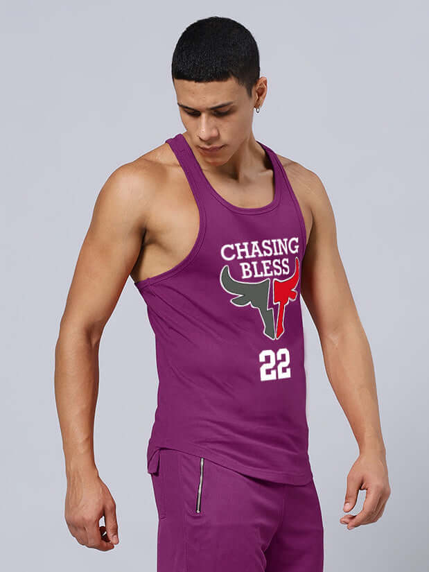 Man wearing Chasing Bless printed gym t-shirt in purple, showcasing custom fit options; ideal for workouts and active lifestyle.