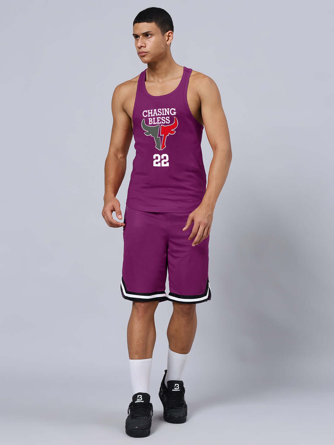 Alt Tag: Man wearing purple Chasing Bless gym co-ord set made of premium cotton and sports polyester, suitable for workouts.
