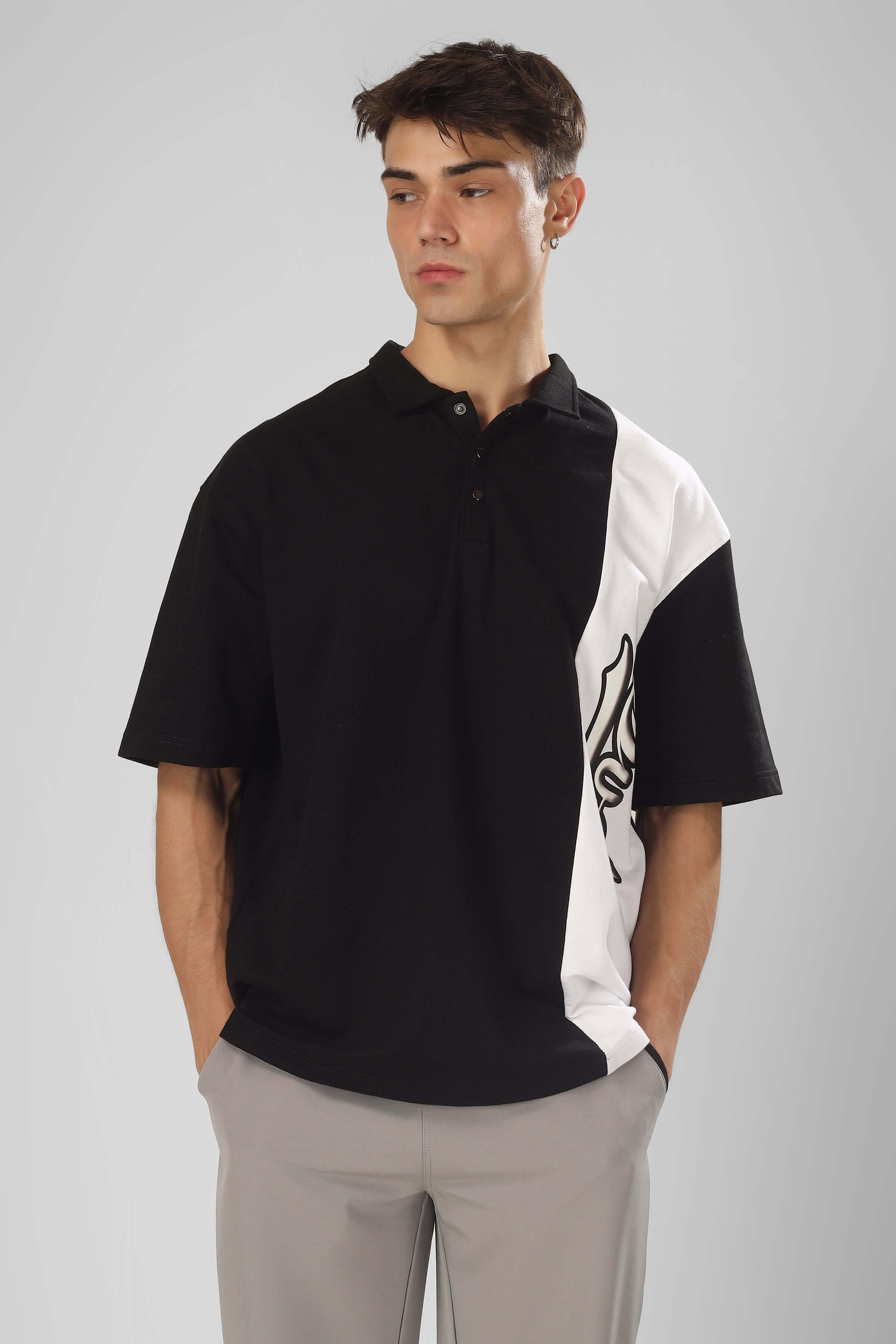 Model wearing Cheugy Oversized Polo T-Shirt in Black-White, featuring premium cotton fabric and a stylish design for casual wear.