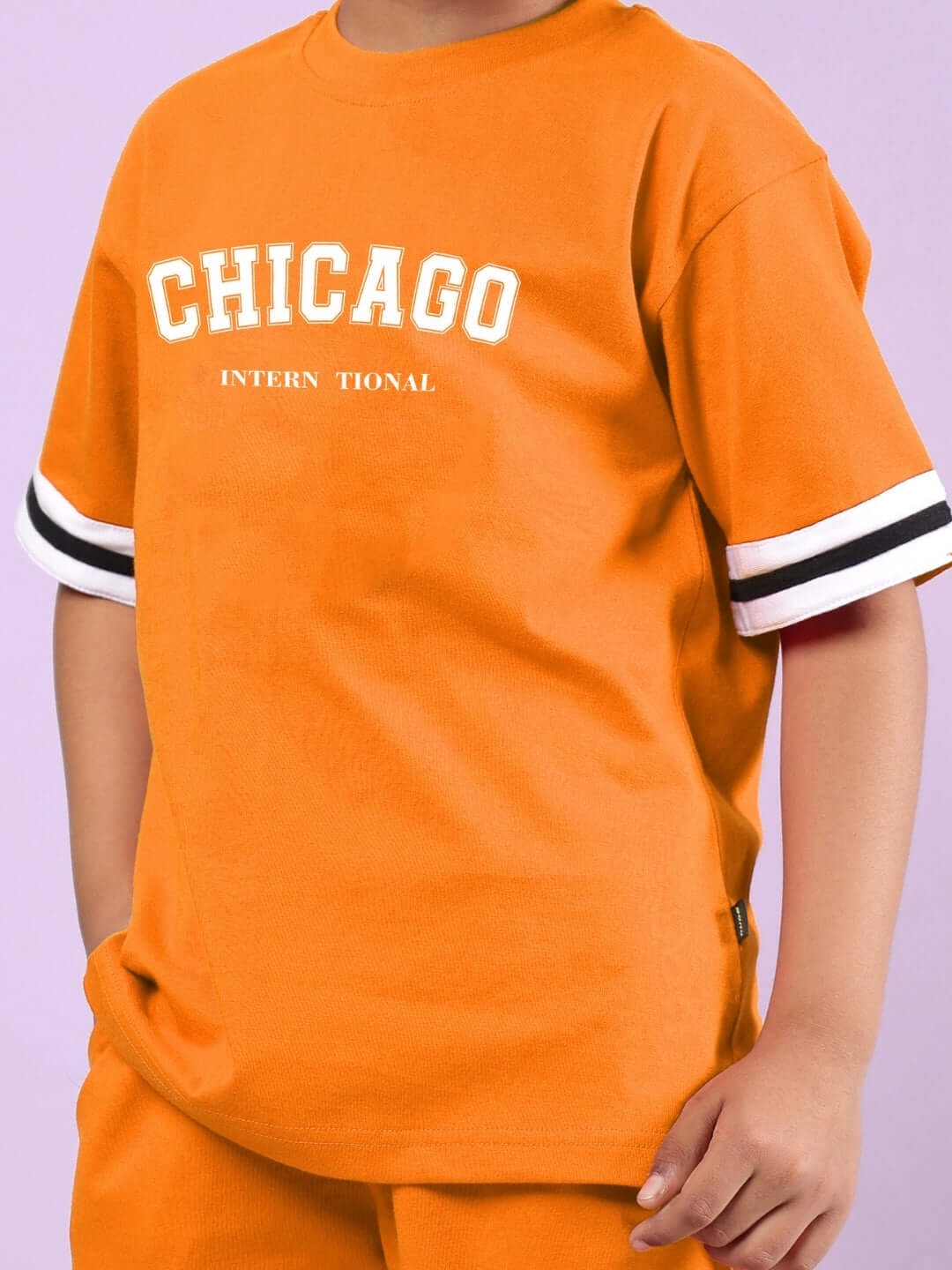 CHICAGO PRINTED CO-ORD FOR BOYS & GIRLS ORANGE, stylish kids' outfit, vibrant and comfortable, made by expert tailors, perfect for casual wear.