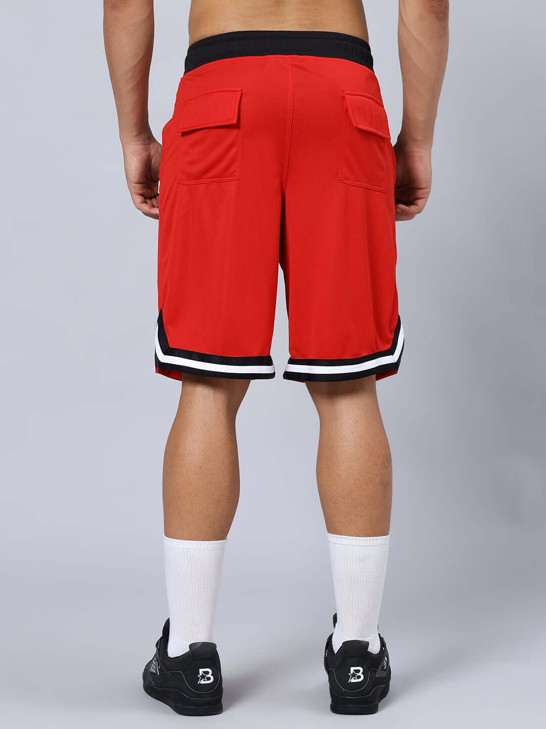 Back view of red Chronic Regular Fit Shorts with black and white trim, showcasing the casual style and fit.