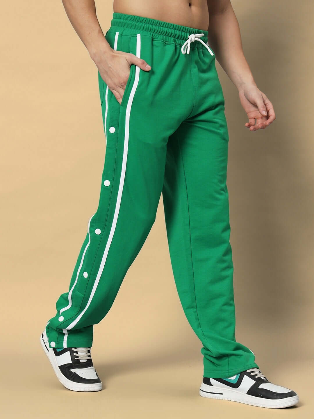 Green contrast panel jogger pants with white stripe, customizable fit, tailored by DUDS.