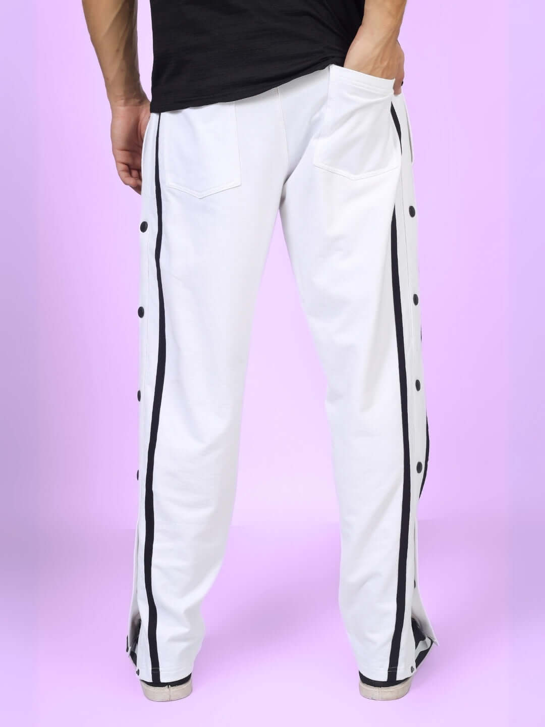 Rear view of white contrast panel joggers with black stripes, designed by DUDS, customizable size for a perfect fit.
