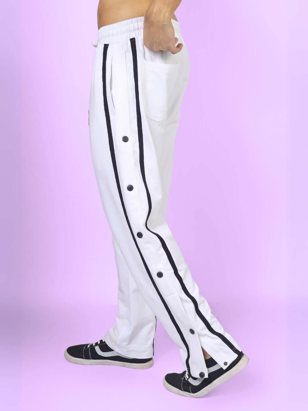 White contrast panel joggers with black side stripes and buttons, made to order by DUDS. Custom fit available for prepaid orders.