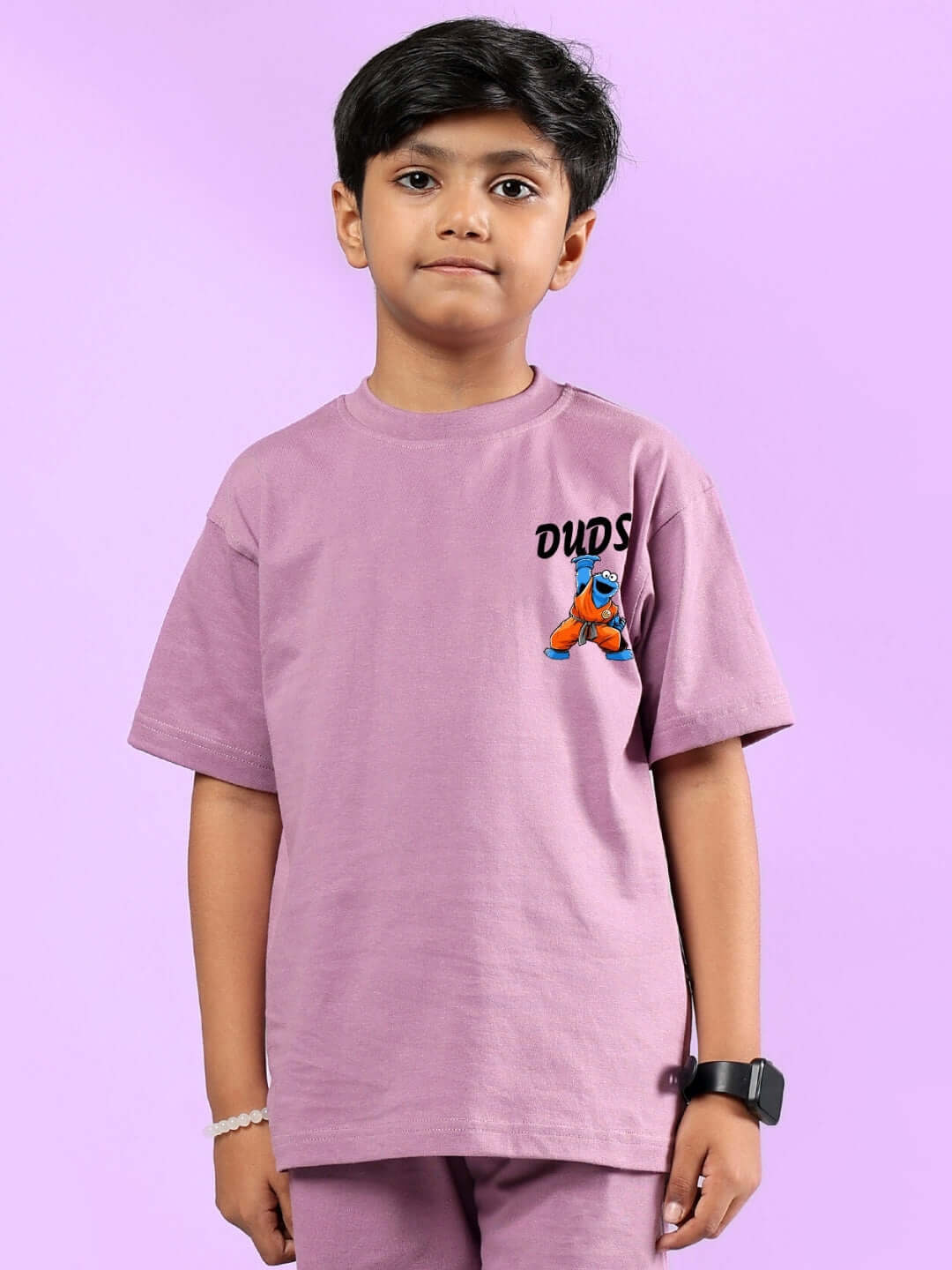 Boy wearing COOKIE MONSTER PRINTED T-SHIRT FOR BOYS & GIRLS PLUM PURPLE by DUDS