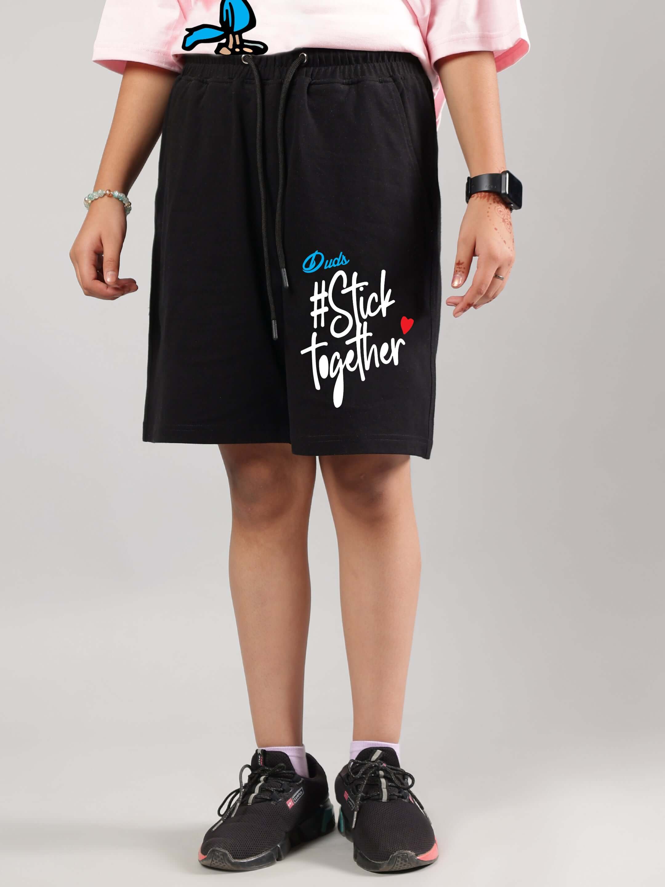 Cool Pals black shorts for boys and girls, featuring '#Stick Together' design, comfortable and customizable fit option available.
