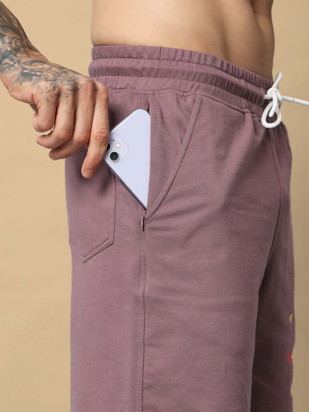 COOL TEDDY Regular Fit Shorts in Chinese Violet with pocket detail and phone.