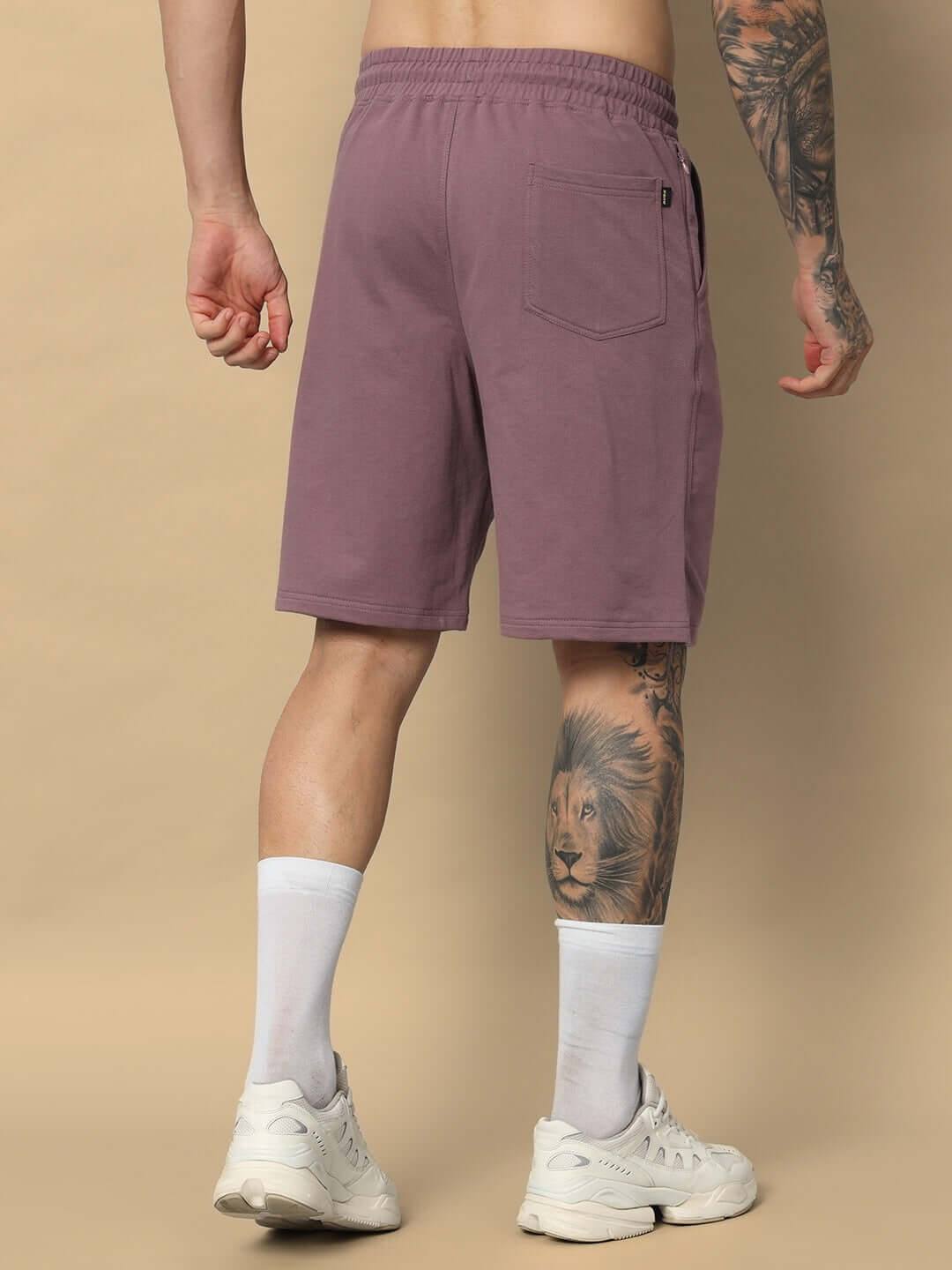 Back view of COOL TEDDY Regular Fit Shorts in Chinese Violet, featuring elastic waistband and back pocket, suitable for custom fitting.