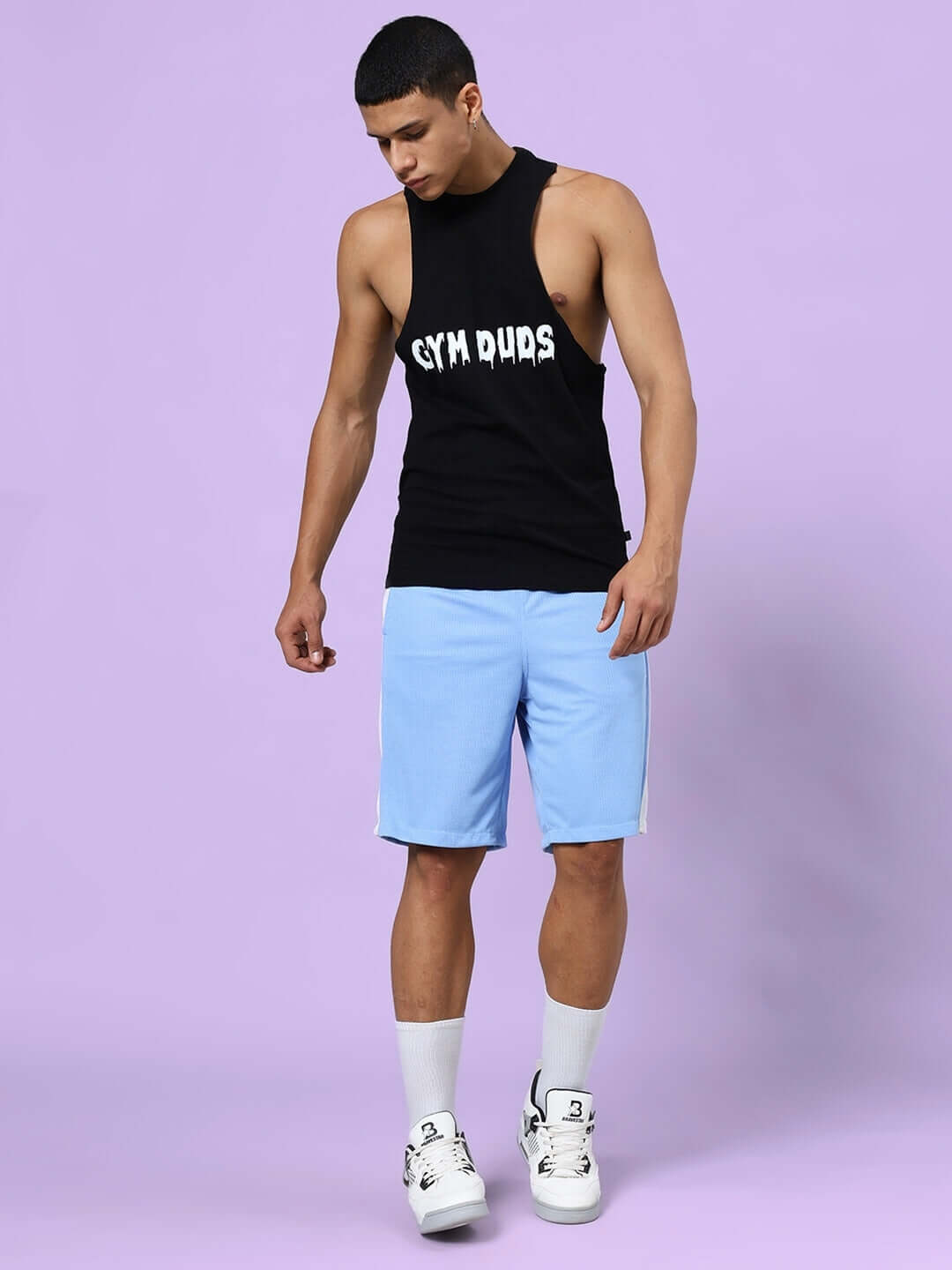 CRUNCH GYM CO-ORD SET BLACK-BLUE featuring a black top and blue shorts, ideal for gym workouts, made with premium cotton and polyester.