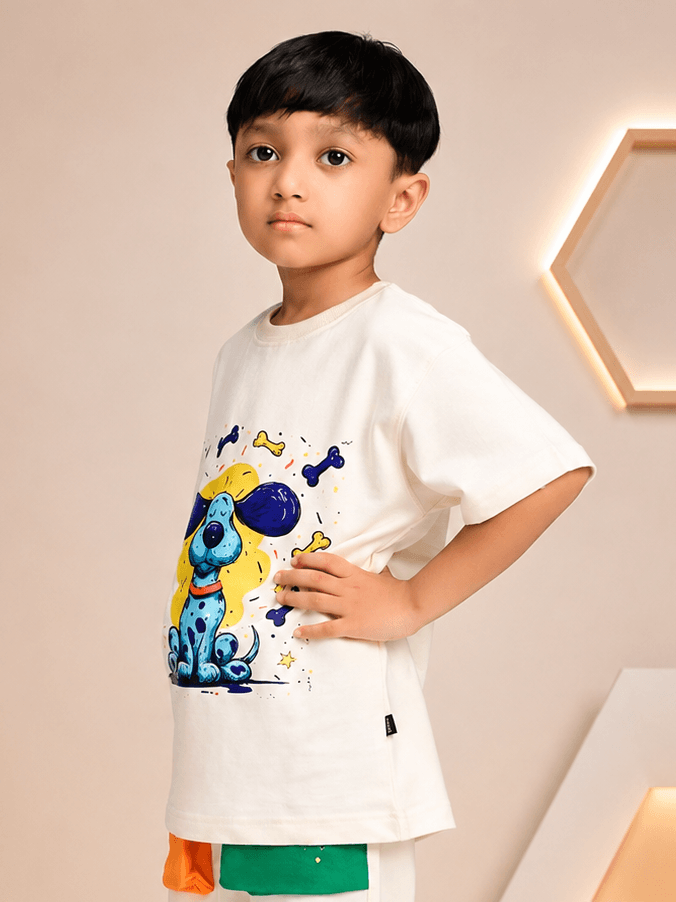 CUTE BLUE PUPPY OVERSIZED T-SHIRT FOR BOYS GIRLS OFF WHITE worn by a boy, featuring a colorful puppy print.