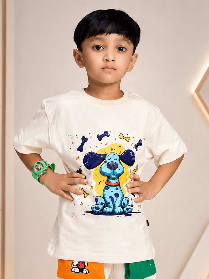 Cute blue puppy oversized t-shirt for boys girls off white, featuring a playful graphic on a young boy.