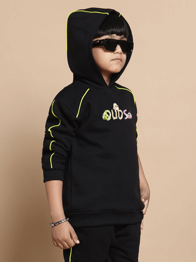 Child wearing CUTE ANGRY BIRD OVERSIZED HOODIE BOYS & GIRLS BLACK with sunglasses and stylish design.
