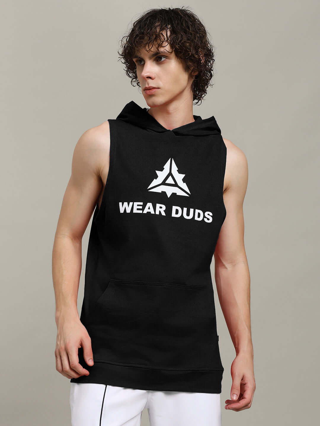 Model wearing black CYBRAN GYM HOODED T-SHIRT by DUDS, customizable fit, sleeveless design with logo print, perfect for gym or casual wear.