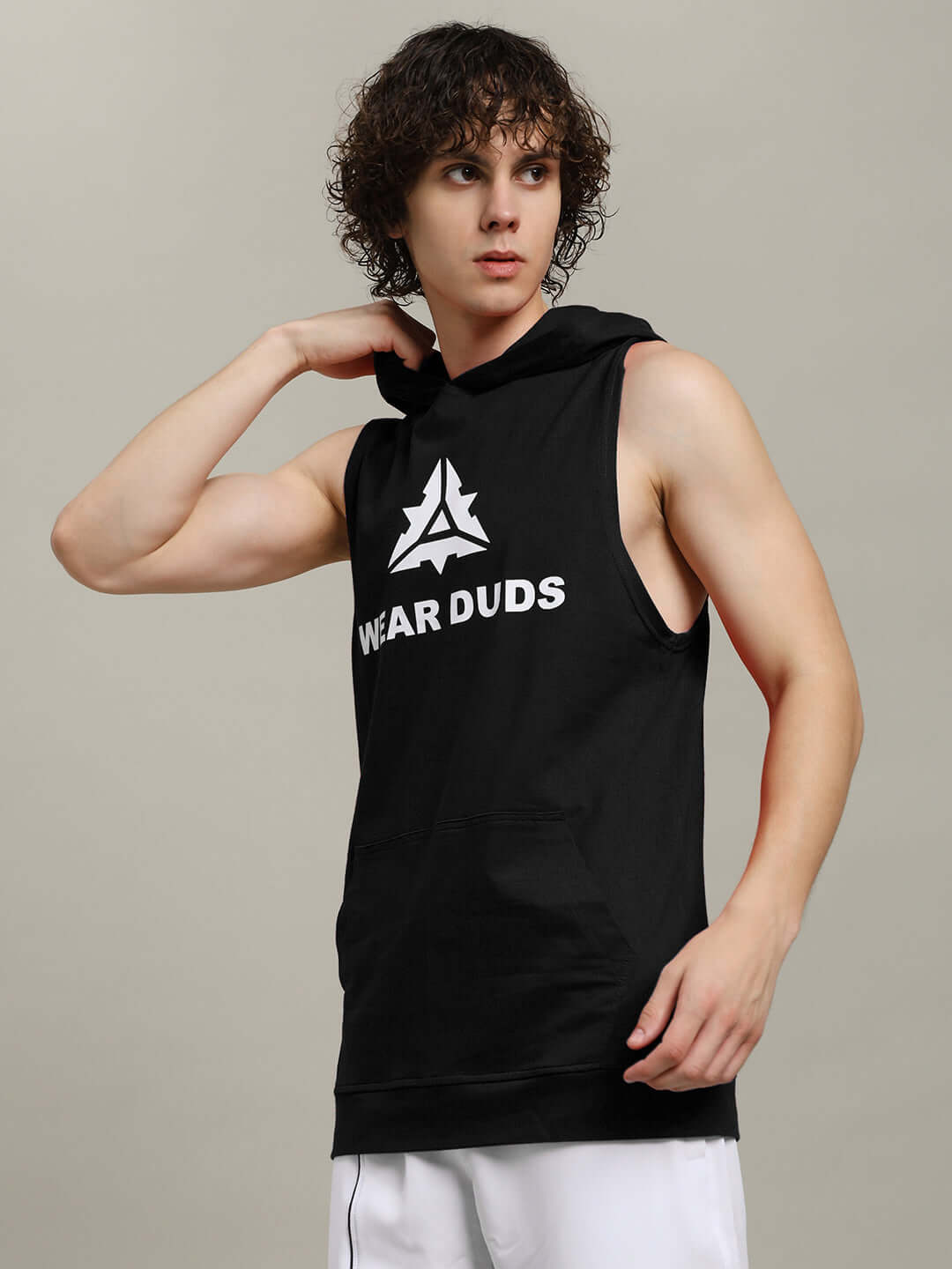 Model wearing CYBRAN Gym Hooded T-Shirt in black, showcasing sleeveless design and sporty style, available with custom fit option.