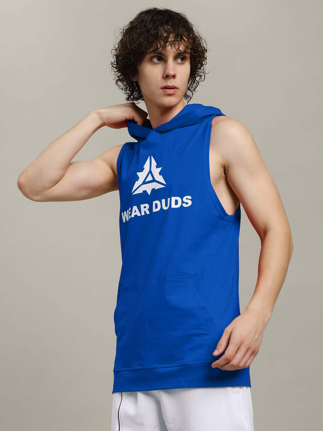 Model wearing CYBRAN Gym Hooded T-Shirt in blue with sleeveless design, branded with "WEAR DUDS" and logo. Customizable fit available.